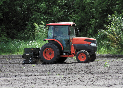 Kubota Tractor Pulling Landscape Seeder