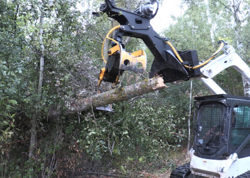 Bobcat Tractor Releasing with Multi-Purpose Grapple